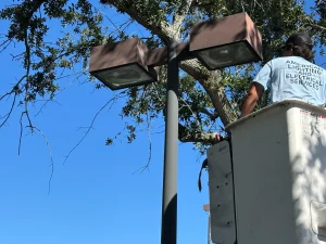 Commercial Bucket Truck Pole Light Repair In South Florida Parking Lot